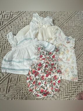 4 boutique brand baby dresses. Size 3-6 months.